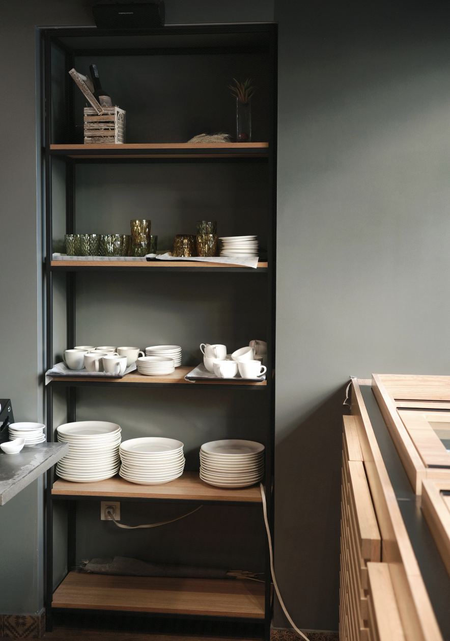 Cartez Brunch restaurant interior with organized dishware and glassware