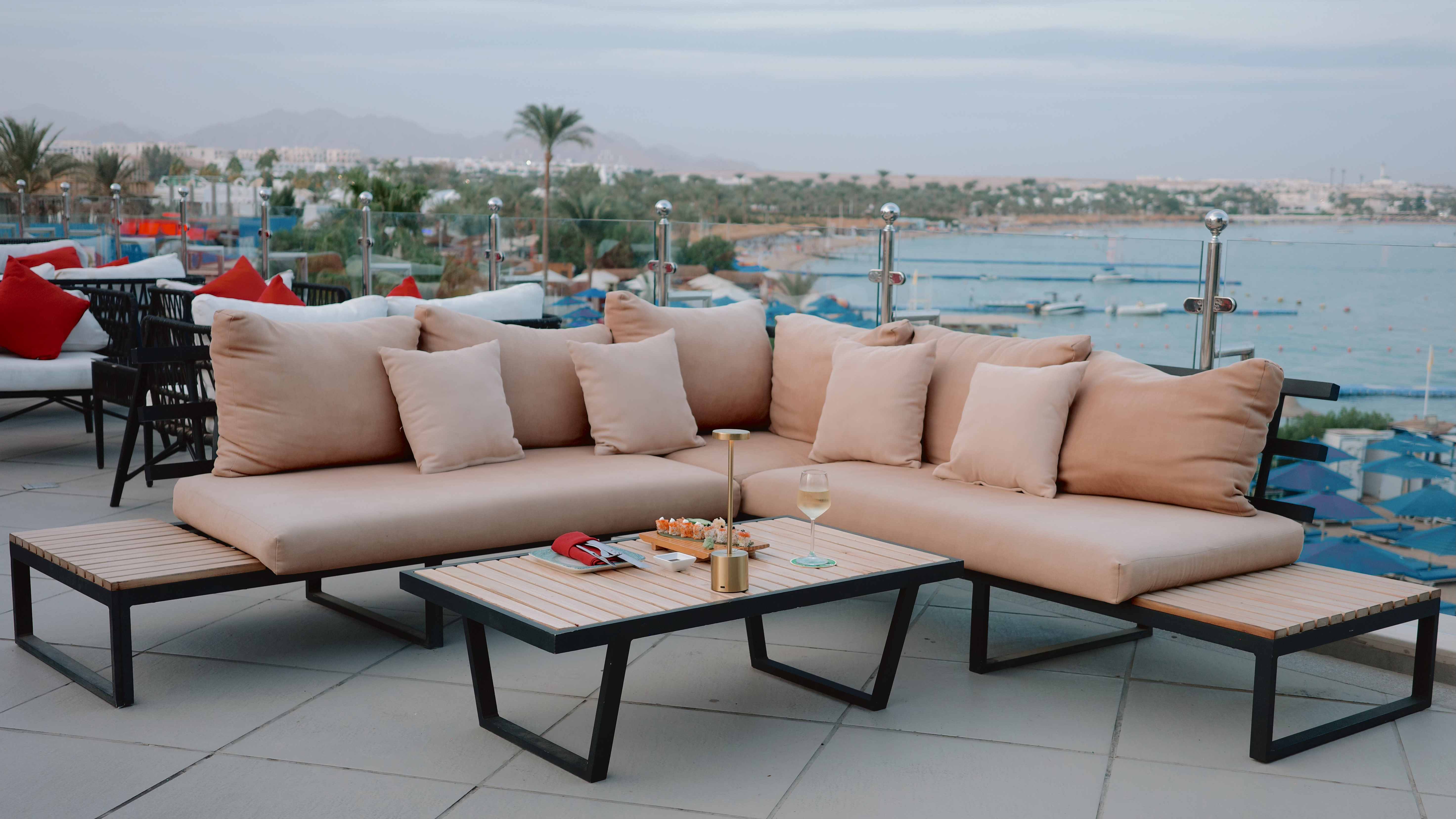 Sky bar lounge with sea view at blue hour